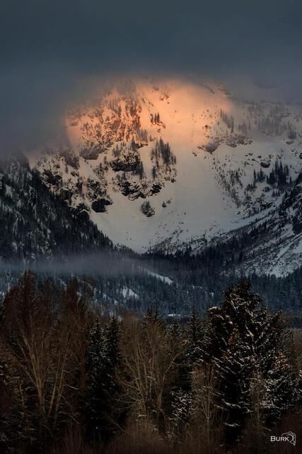 Alpenglow on the Grand Teton mountain range in Moose, Wyoming.