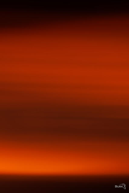 Created using intentional camera movement, sunset orange. 