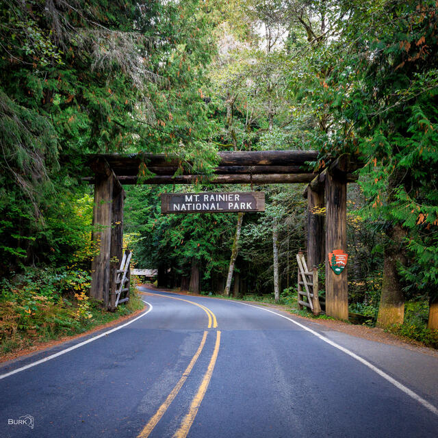 The southwest entrance sign to Mount Rainier National Park, located approximately six miles east of Ashford, Washington, along State Route 706. The National 