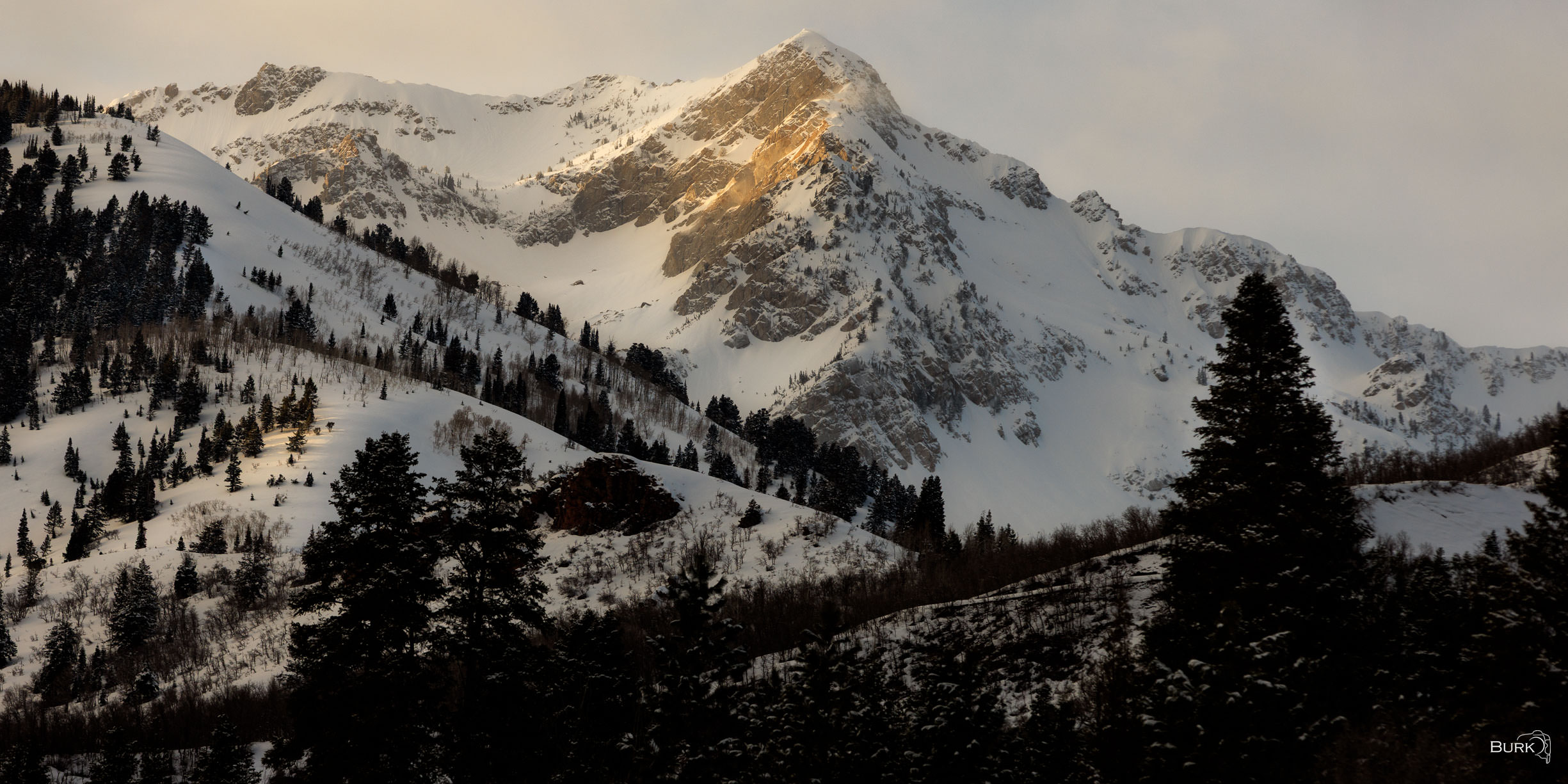 Winter Alpenglow Alpenglow on winter snow mountain.