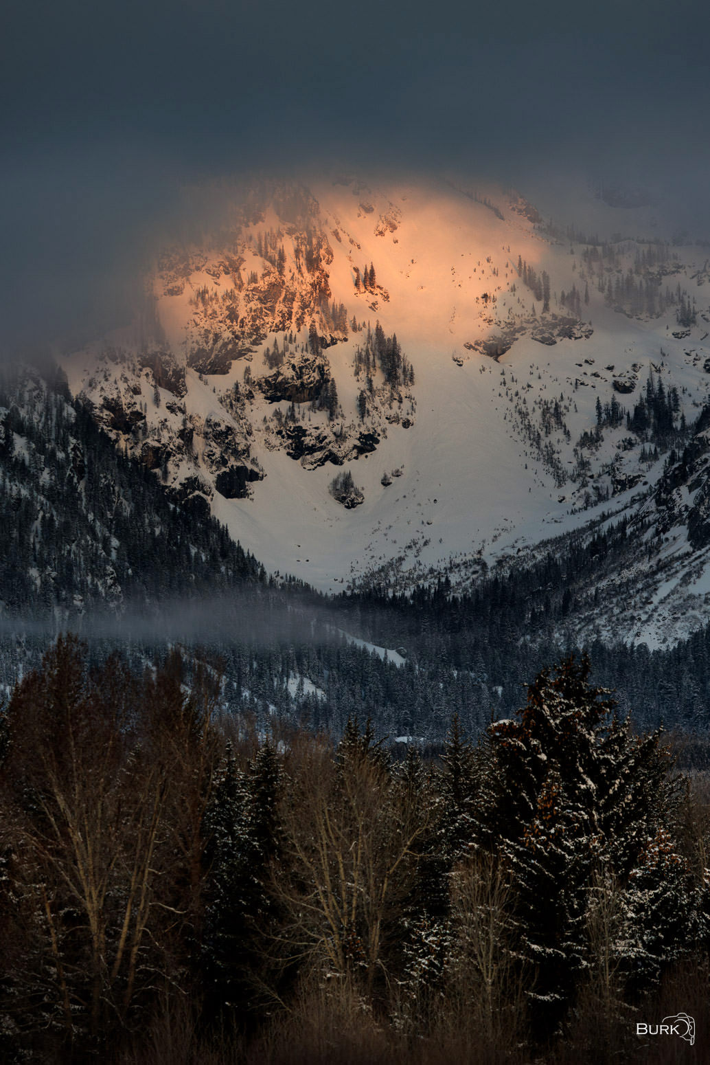 Grand Teton Alpenglow Alpenglow on the Grand Teton mountain range in Moose, Wyoming.