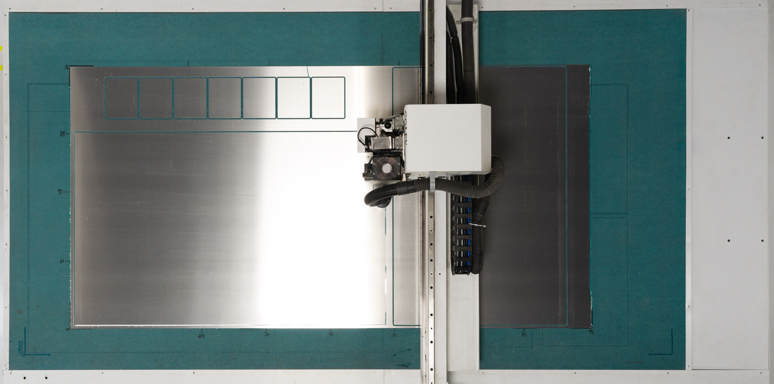 The cutting of metal for printing.